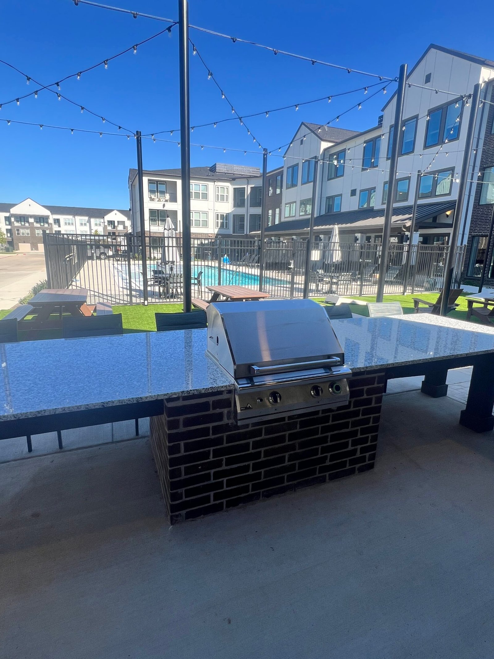 PGS built-in grill installed on apartment rooftop pool deck amenity space in Texas